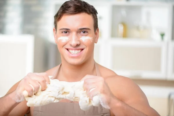 Young grinning muscular man — Stock Photo, Image