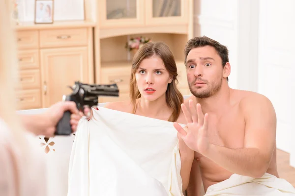 Lovers lying in bed — Stock Photo, Image