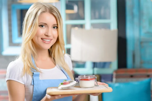 Pleasant waitress waiting at table — Stock Fotó