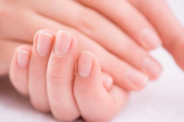 Pleasant woman making hand massage