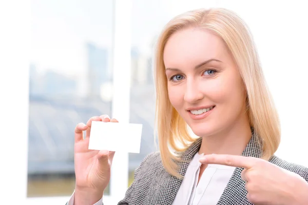 Nice businesswoman holding card — Φωτογραφία Αρχείου