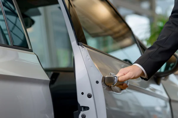 Car door is about to be opened. — Stok fotoğraf