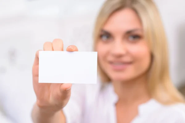 Young girl showing her business card. — Stock Photo, Image