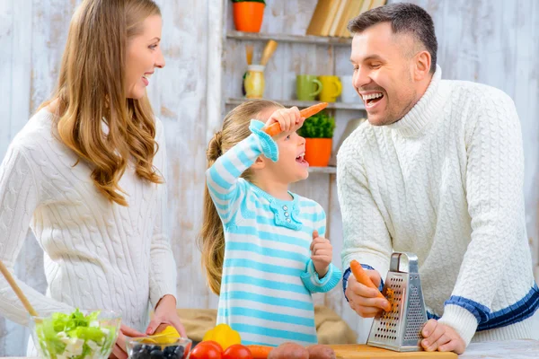 Happy family cooking together — Stock Photo, Image