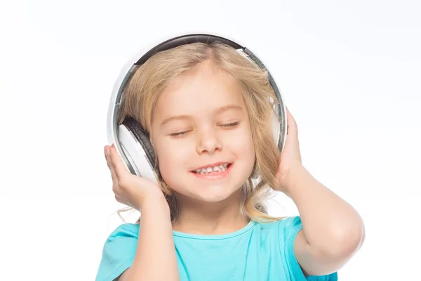 Little girl enjoying the music. — Stock Photo, Image