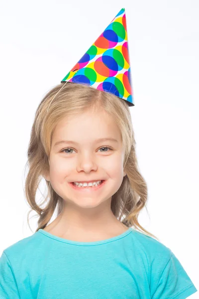 Little girl wearing party cap. — Stock Photo, Image