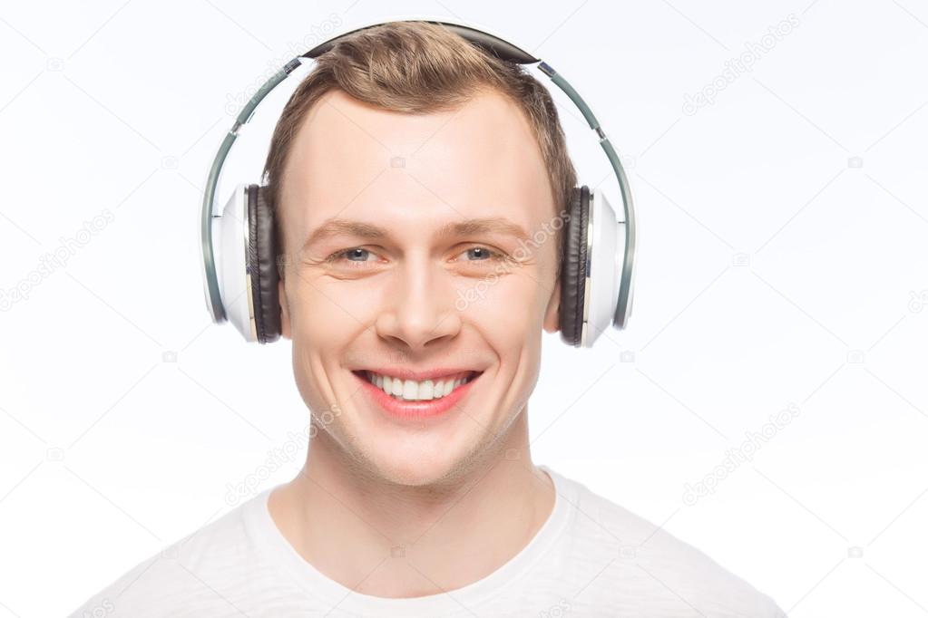 Handsome man wearing headphones.