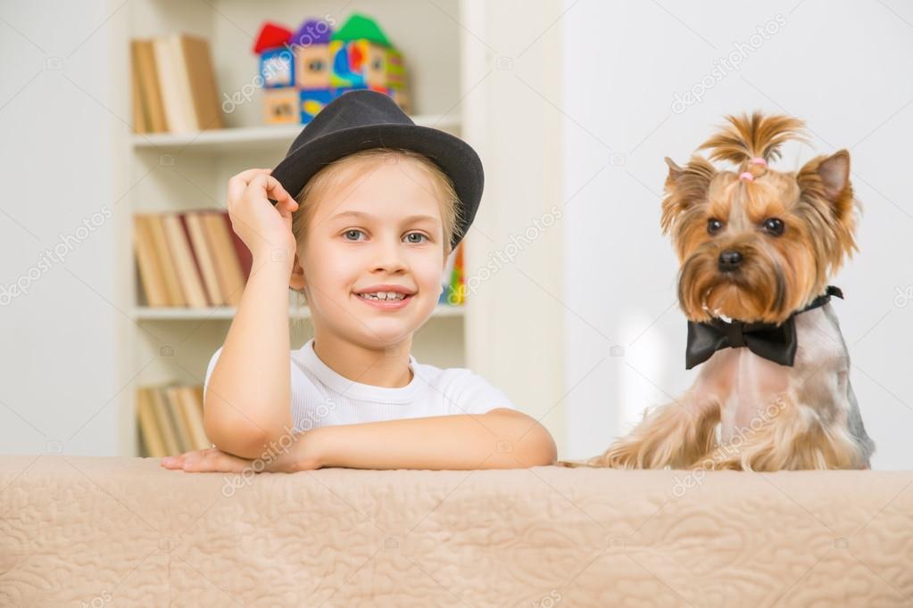 Smiling girl and her pet