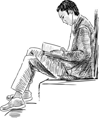 Öğrenci kitap okuyor.