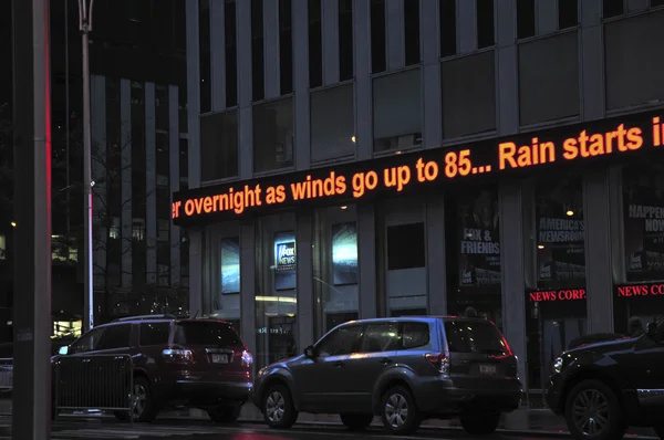 News ticker during storm updating status of Hurricane Sandy — Stock Photo, Image