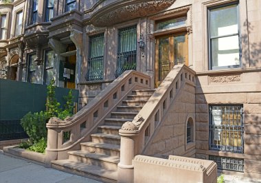 Brownstone apartment building with staircase