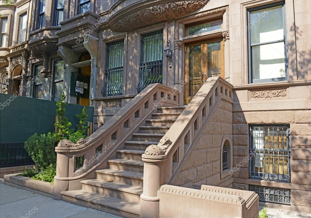 Brownstone apartment building with staircase — Stock Photo © Nyker