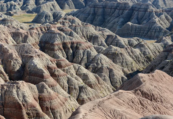 Badlands landscape, formed by deposition and erosion by wind and water, contains some of the richest fossil beds in the world, Badlands National Park, South Dakota, USA — Stock Photo, Image