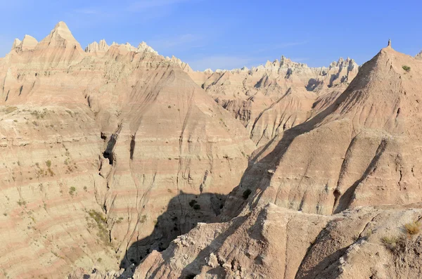 Badlands landscape, formed by deposition and erosion by wind and water, contains some of the richest fossil beds in the world, Badlands National Park, South Dakota, USA — Stock Photo, Image