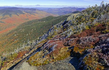 Alpine scene on climb of Gothics Mountain, in Autumn with forest colors in the distance, Adirondacks, New York