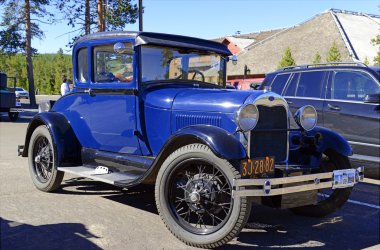 Model A Ford in parking lot clipart