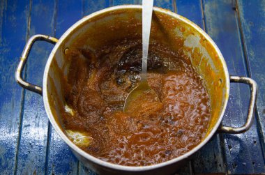 Bakır tavada yapılmış kabak reçeli. Balkabağı reçeli geleneksel bir Brezilya mutfağıdır. Tipik bir mutfak tatlısı. Balkabağı aslında Amerikan kıtasından gelen bir meyvedir..