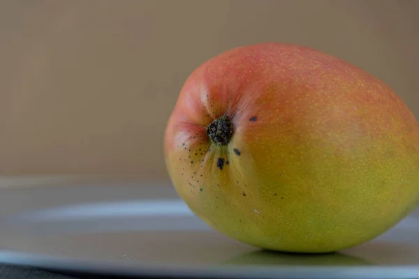 Fresh pink mango fruit. Sweet fruit from northeastern Brazil. Strains that gave rise to the famous White Widow. fruit of Asian origin, more precisely from India.