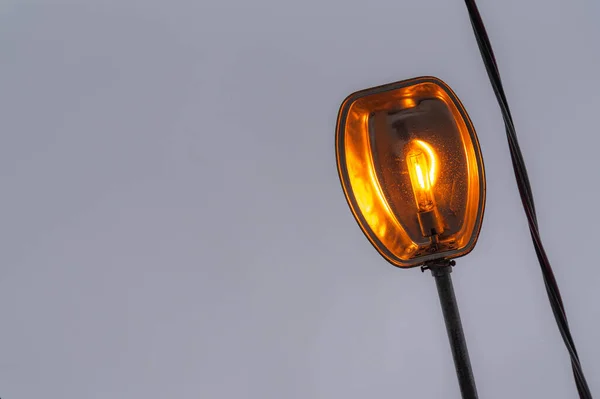 Lamp on for public lighting. Urban lighting infrastructure. Incandescent lamp.