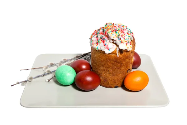 Easter cake with eggs and willow on the plate — Stock Photo, Image