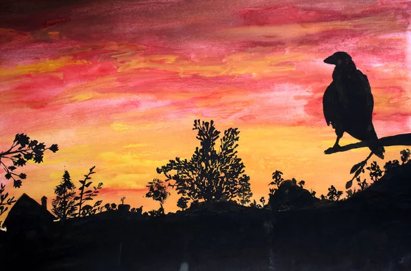 Raven on tree and sunset