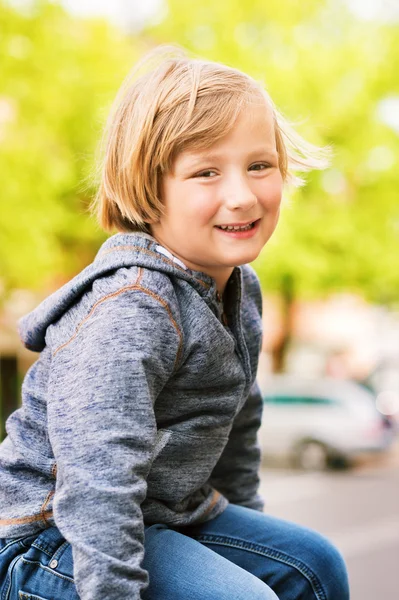 Fashion portrait of adorable toddler boy wearing grey sweatshirt — Stock Photo, Image