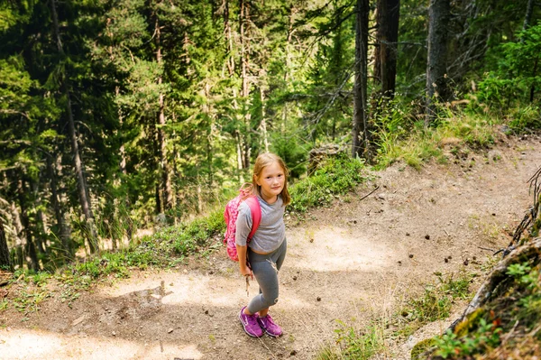 Little hiker girl in forest. Photo from Champex-Lac, Valais, swiss Alps, top view — Stock Photo, Image