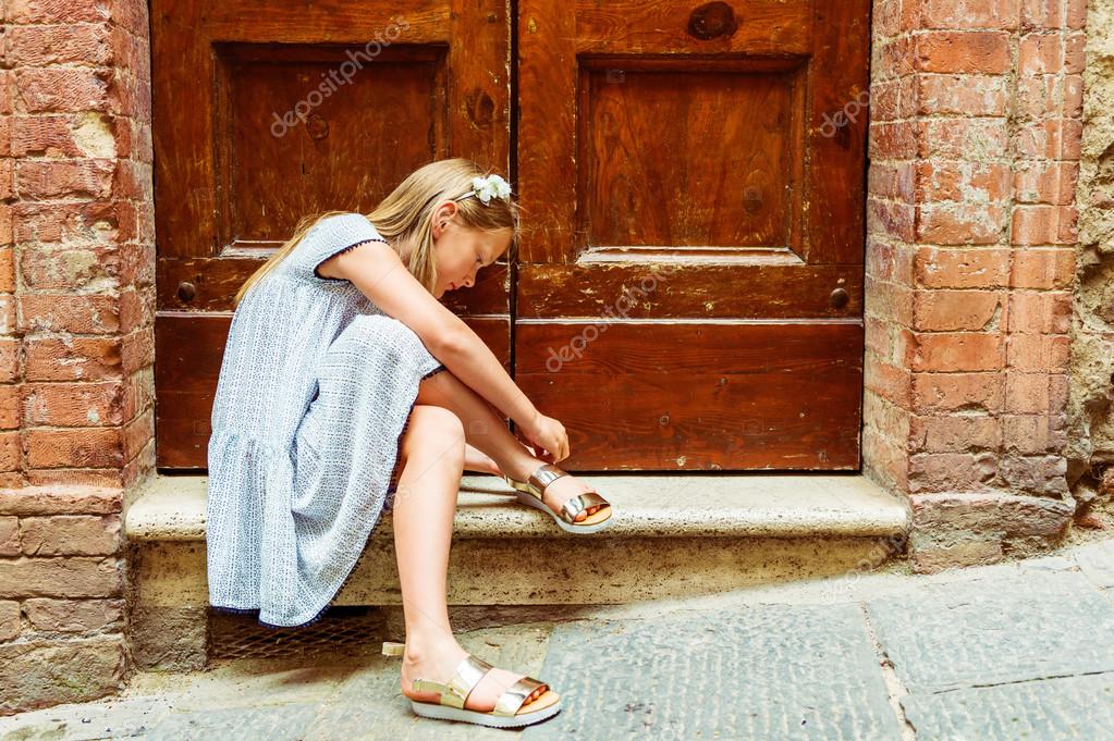 little girl in sandals