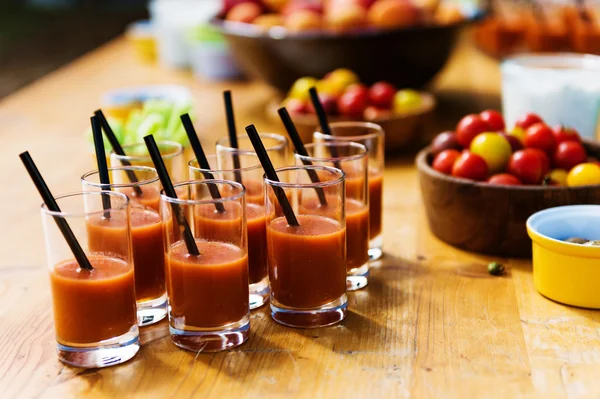 Authentic appetizers on rustic  table, gazpacho, fresh hand picked tomatoes, countryside dinner, party time