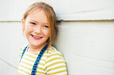 Close up portrait of adorable young 8 years old
