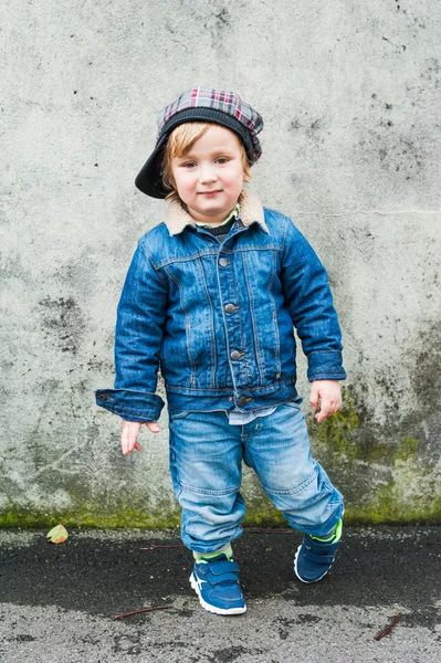 Outdoor portrait of a toddler boy, wearing denim clothes — Stock Photo, Image