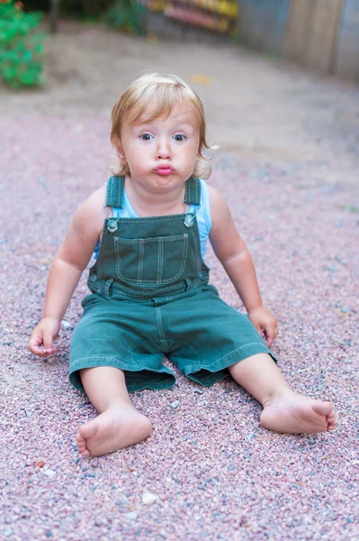 Portrait of adorable toddler boy with funny expression on his face — Stock Photo, Image