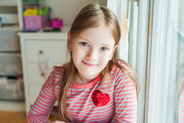 Portrait of adorable little girl in her room — Stock Photo, Image