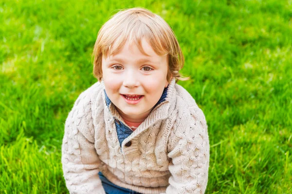 Outdoor portrait of adorable toddler boy Stock Picture
