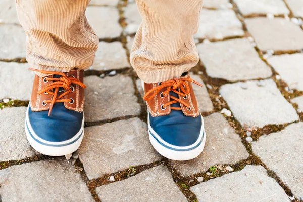 Fashion sneakers on kid's feet — Stock Photo, Image