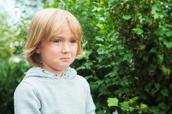 Close up portrait of a sad little boy — Stock Photo, Image
