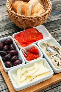 Appetizer food or tapas on wooden table