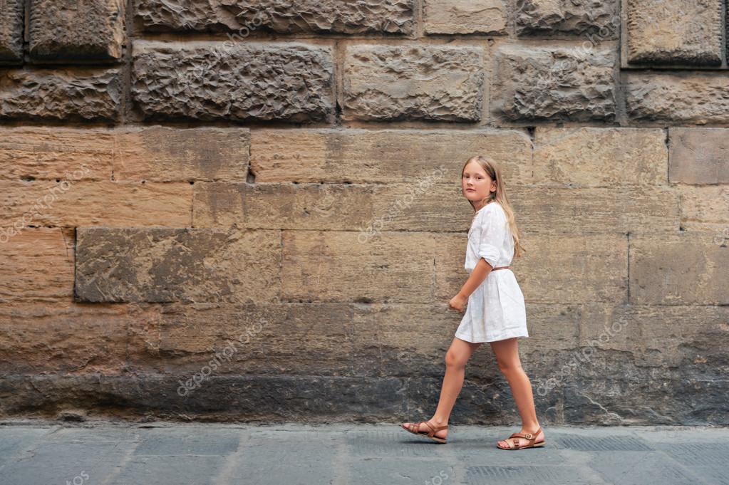 little girl wearing flip flops