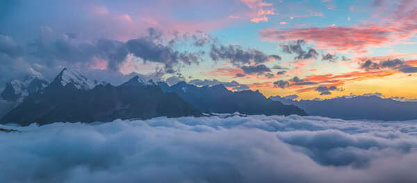 Sunset over Caucasus mountains