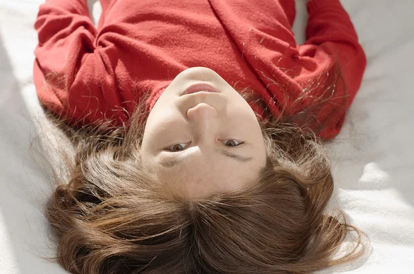 Girl upside down looking portrait — Stock Photo, Image