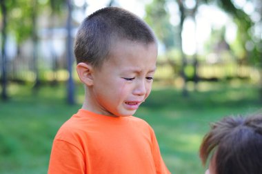 little boy crying with tears outdoor clipart