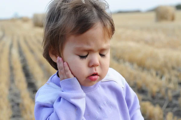 Little girl portrait complaining an ache — Stock Photo, Image