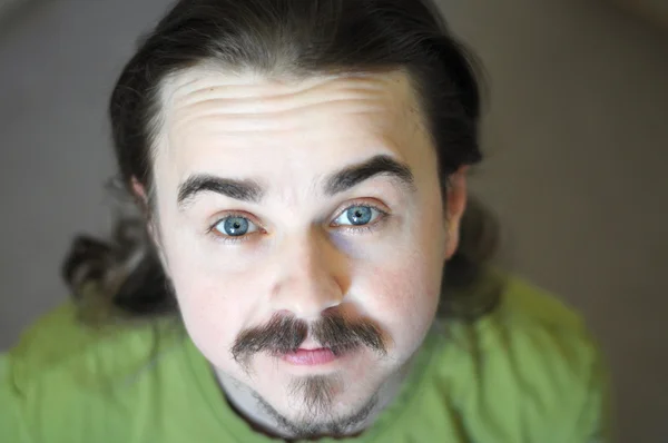 Looking up young man smiling portrait with beard — Stock Photo, Image