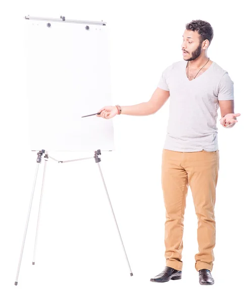 Latino-Tutor zeigt auf Flipchart-Ausschnitt — Stockfoto