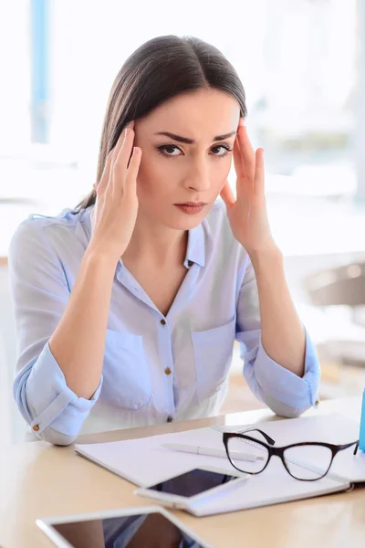 Sad woman having horrible headache. — Stock Image Sad woman having horrible headache. Stock Photo
