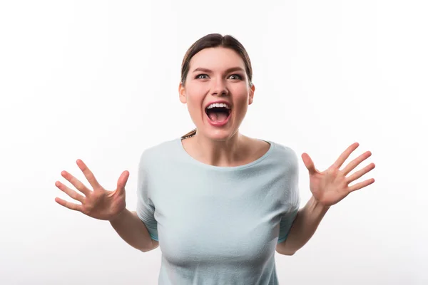 Jubilant girl standing isolated on white background — Stock Photo, Image