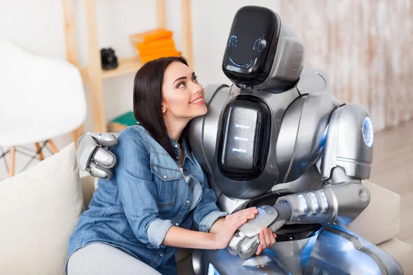 Girl and robot bonding to each other — Stock Photo, Image