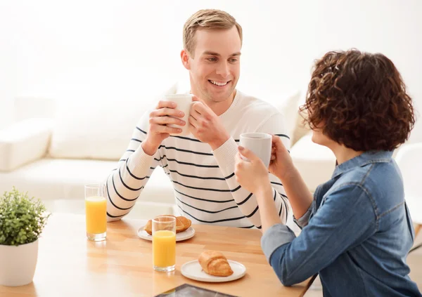 Positive couple having  a meal — Stock Photo, Image