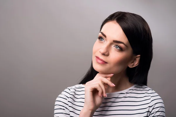 Thoughtful girl standing isolated — Stock Photo, Image