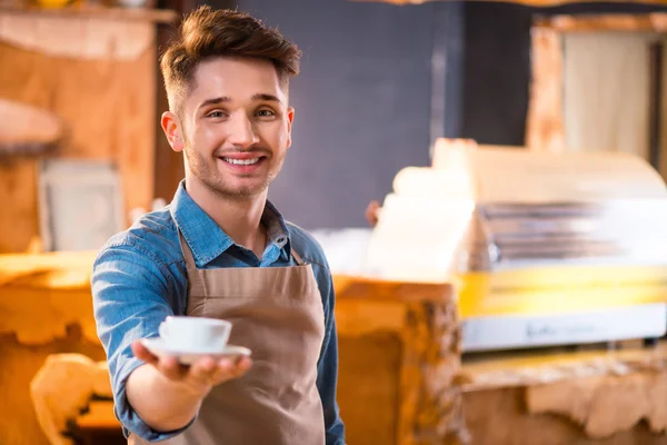 Pleasant waiter  working in the cafe — Stock Photo, Image